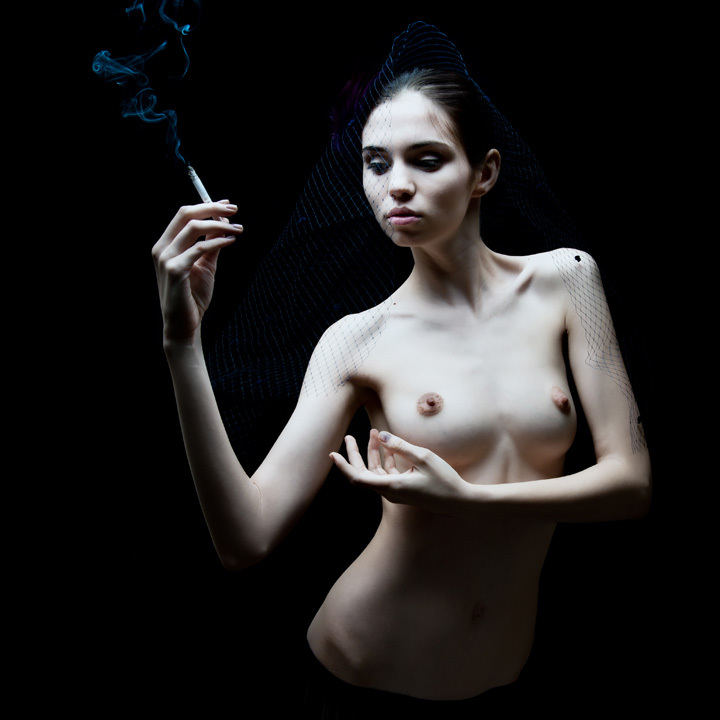 Smoking dressed the naked woman • Marc Lamey