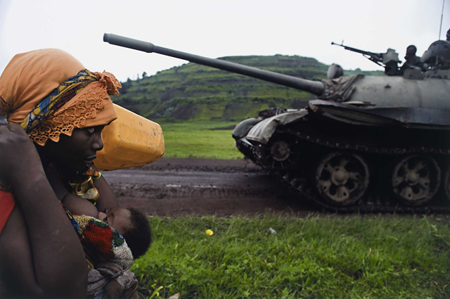 War / Photography: Images of Armed Conflict and Its Aftermath by Anne Wilkes Tucker, Will Michels and Natalie Zest (Yale University Press) - Walter Astrada, Argentinean, born 1974, Congolese women fleeing to Goma, from the series Violence against women in Congo, Rape as weapon of war in DRC, 2008, Chromogenic print, The Museum of Fine Arts, Houston, museum purchase with funds provided by Photo Forum 2010 © Walter Astrada